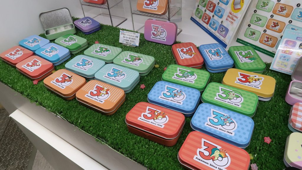 0周年のロゴをデザインしたミニ缶ケースコレクション